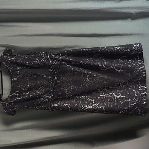 Calvin Klein black lace dress, fully lined with patent leather belt